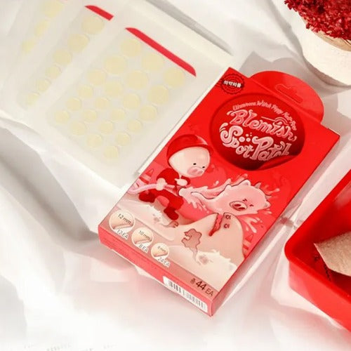 ELIZAVECCA Witch Piggy Hell-Pore Blemish Spot Patch 44 EA packaging on display with product shown in background.