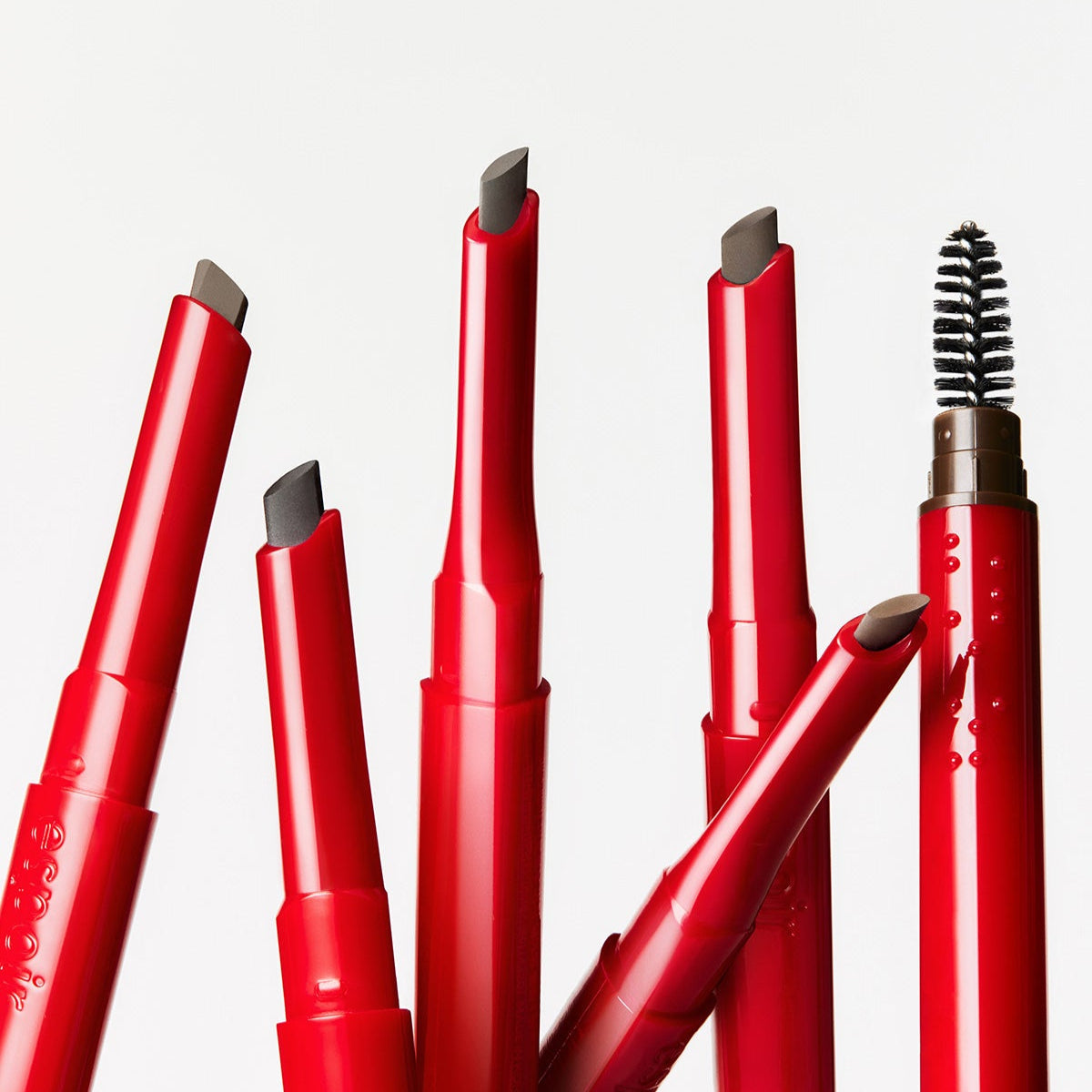 ESPOIR THE BROW EASY SHAPING PENCIL in red casing displaying different pencil tips.