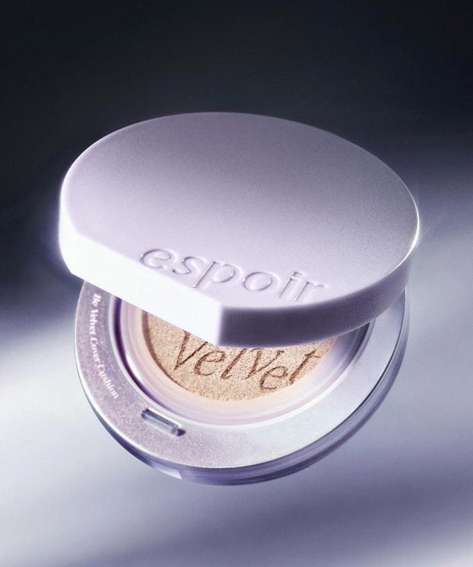 ESPOIR Bevelvet Cover Cushion SPF42 PA++ [Galaxy Beam Collection] compact with sleek design in soft lighting.