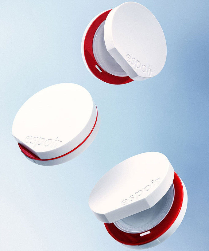 ESPOIR Bevelvet Sebumcut Cooling Cushion with white and red compact design on a blue background