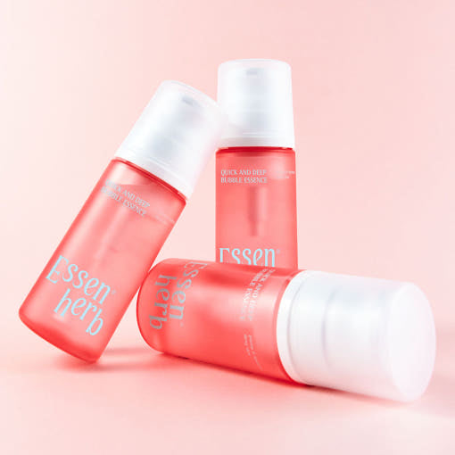 ESSENHERB Quick & Deep Bubble Essence 97ml skincare bottles on pink background