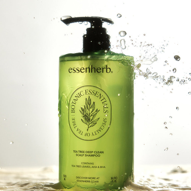 ESSENHERB Tea Tree Deep Clean Scalp Shampoo 500ml bottle with water splash highlighting the packaging.