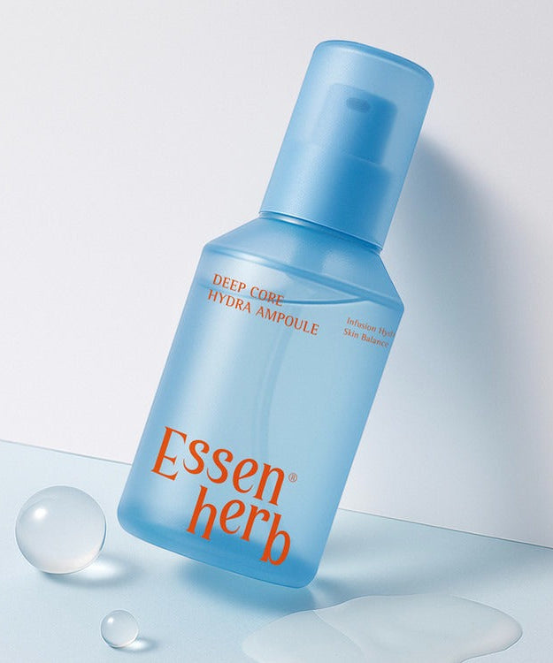 ESSENHERB Deep Core Hydra Ampoule 120ml bottle on a light background with water droplets, showcasing skincare product design and packaging.