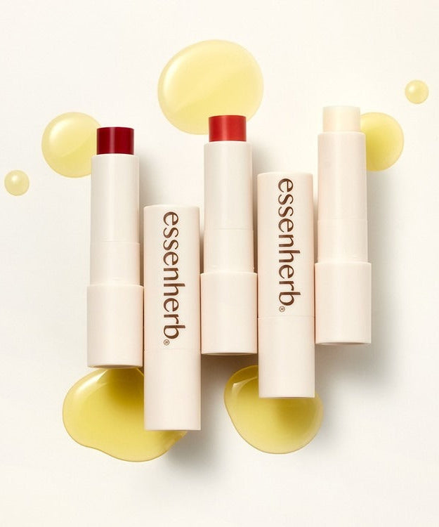 ESSENHERB Jojoba Essentail Lip Balm 4g with glossy texture showcased on white background