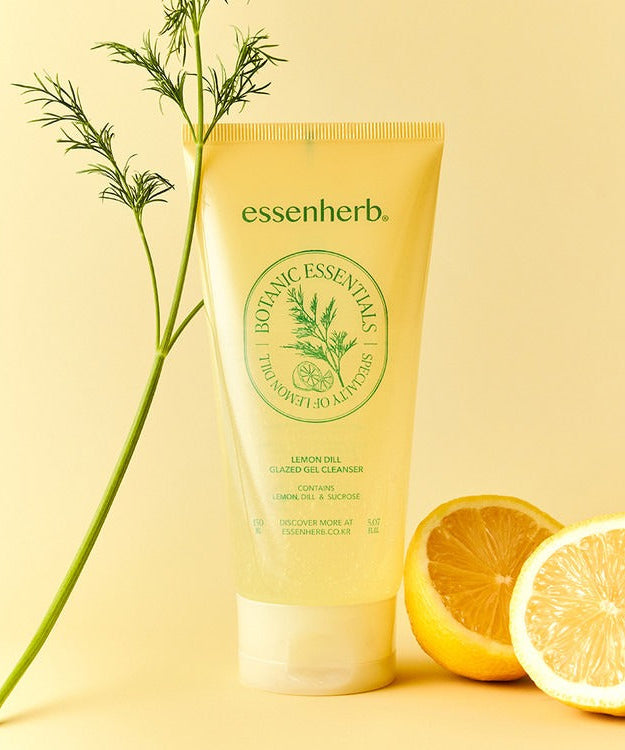 ESSENHERB Lemon Dill Glazed Gel Cleanser 150ml tube with lemon and dill on yellow background