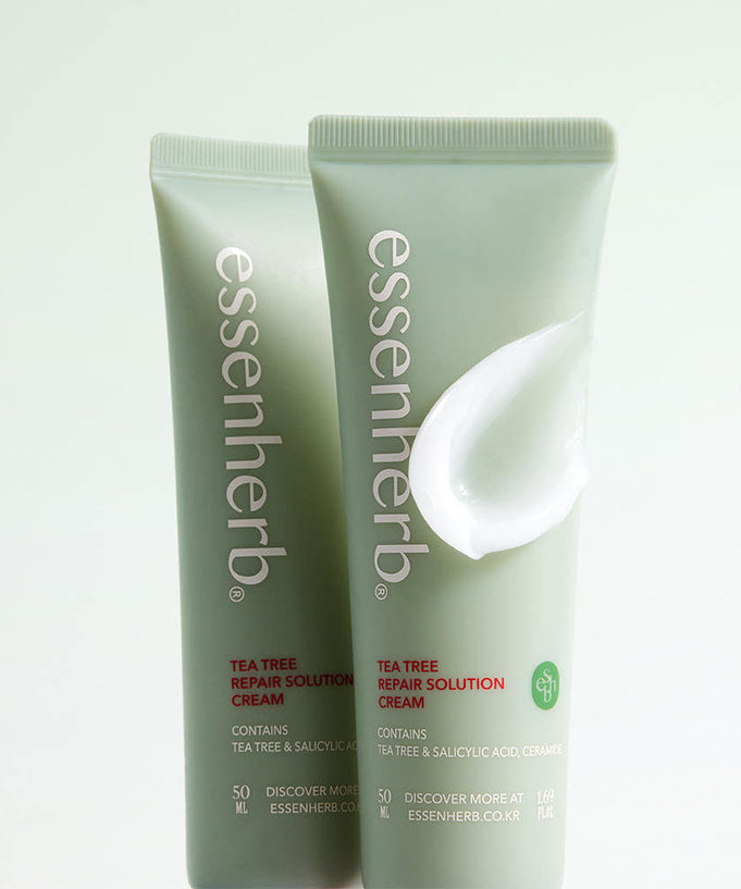 ESSENHERB Tea Tree Repair Solution Cream 50ml tubes with lotion swatch on packaging