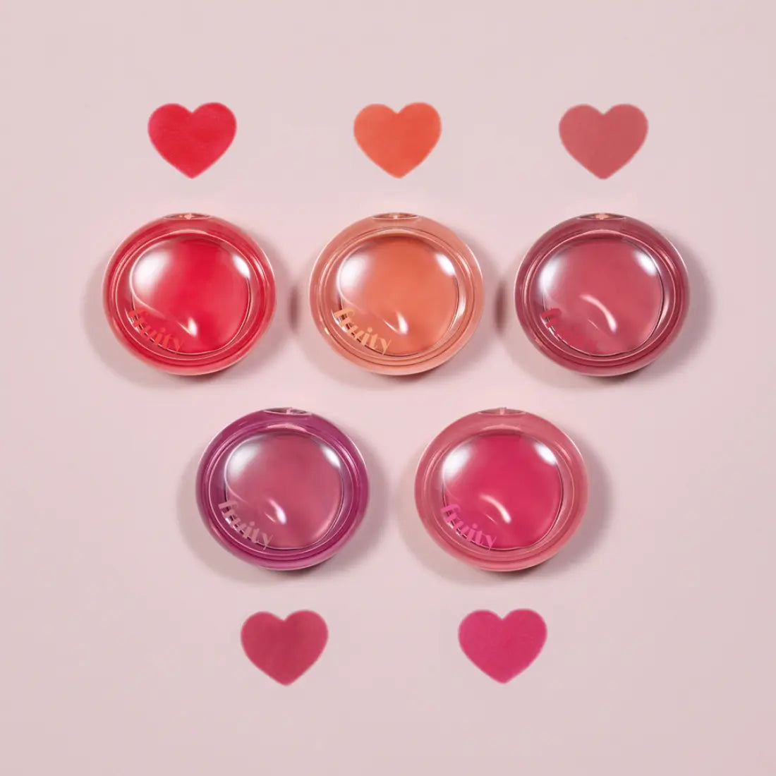 ETUDE Fruity Lip & Cheek Blur Balm 2.3g in five vibrant shades with heart motifs on a pink background