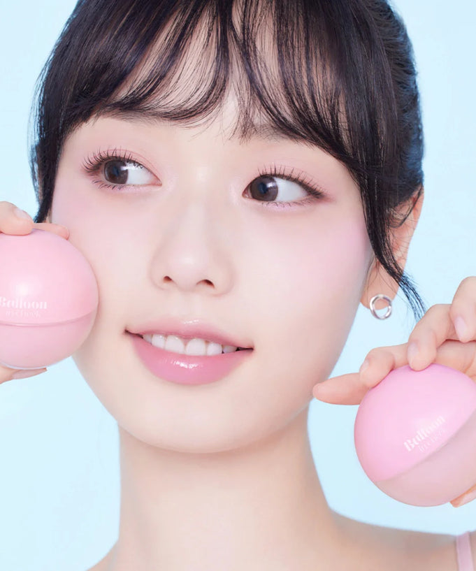 Person holding ETUDE Balloon in cheek 6g product.