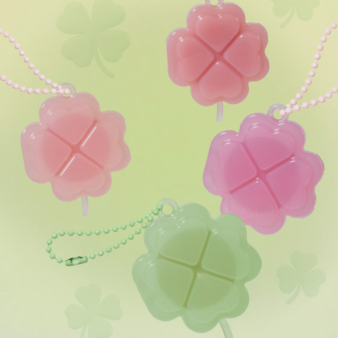 ETUDE Lucky Lip Ham Cheek [Positive Love Edition] featuring clover-shaped keychains in pink and green shades against a pastel background.