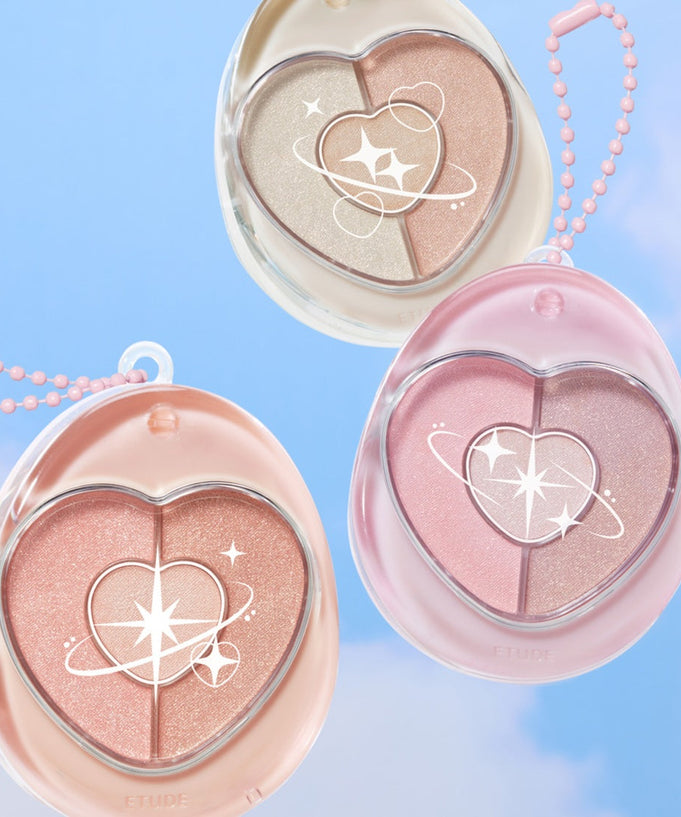 ETUDE Poyong Eye Maker eye shadow compacts in pastel colors against a blue sky background