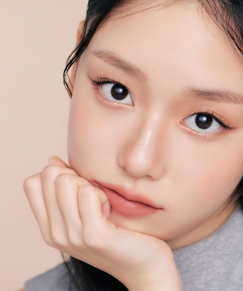 Model showcasing makeup applied with ETUDE Re-creation Maker Aegyo-sal Liner for enhanced eye beauty.