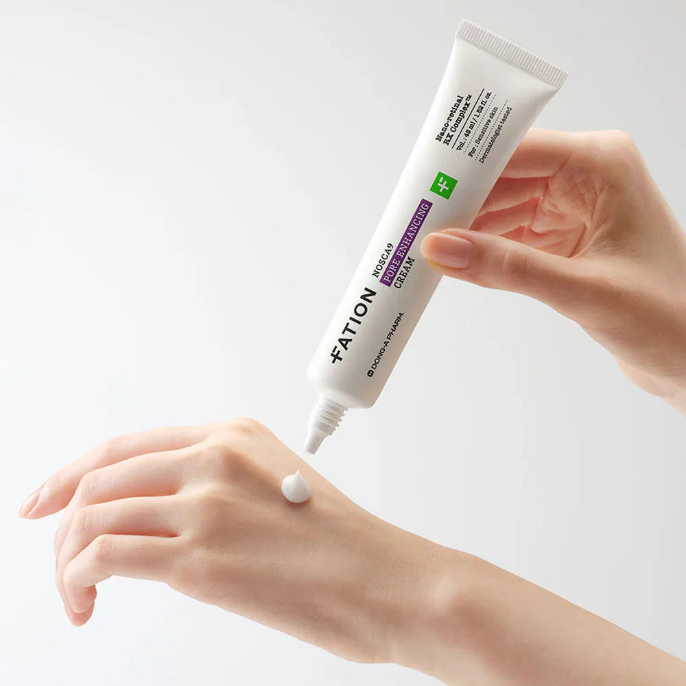 FATION Nosca9 Pore Enhancing Cream 45ml being applied to skin, showing texture and packaging.
