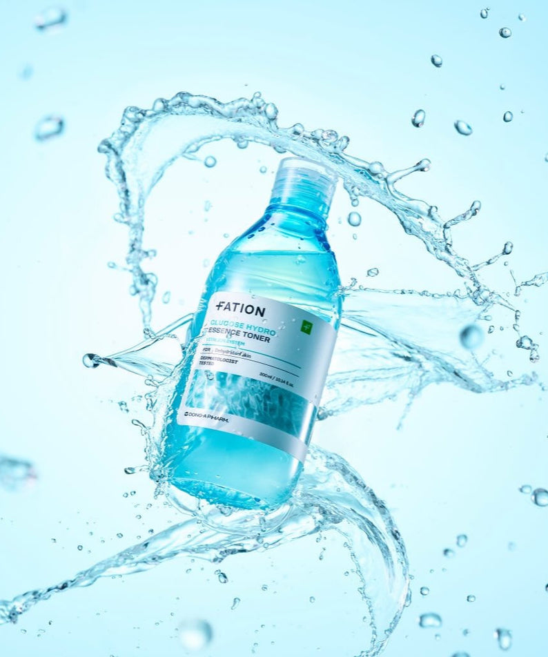 FATION Glucose Hydro Essence Toner 500ml bottle with water splash effect, perfect for hydration and skincare routine.