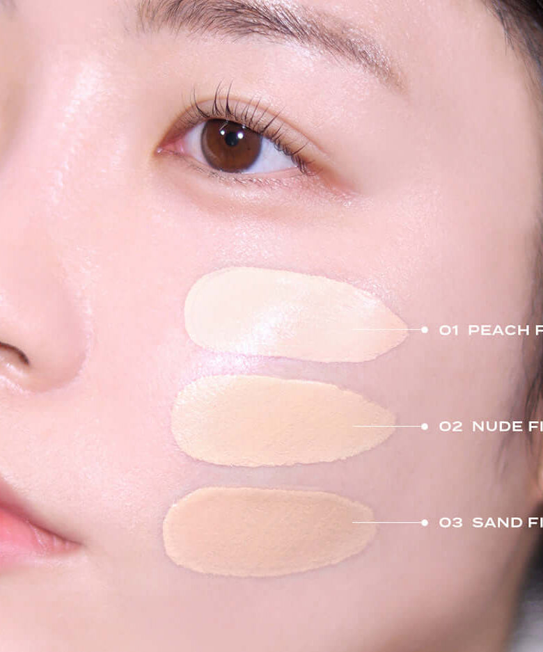 FEEV Hyper-Fit Silky Cushion applied in shades Peach Fit, Nude Fit, Sand Fit on woman's cheek for tone comparison.