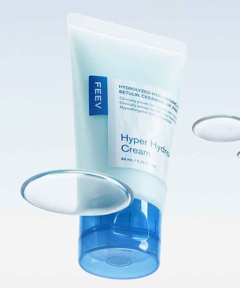 FEEV Hyper Hydro Cream 80ml tube with floating water droplets highlighting hydrating properties.