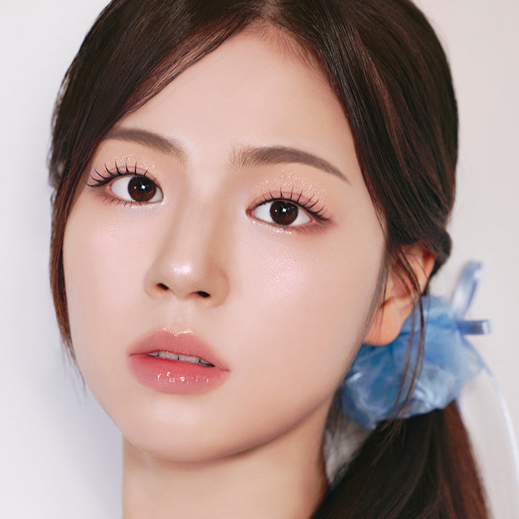 Model wearing FORENCOS Starlight Liquid Glitter for eye makeup, close-up view showcasing luminous finish and sparkling effect.
