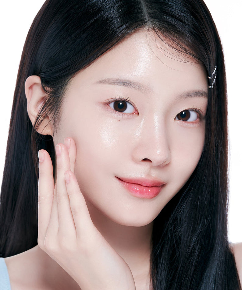 Woman applying FORENCOS Plum C Mild Mild Acidic Toner 300ml to her face, highlighting skincare benefits.