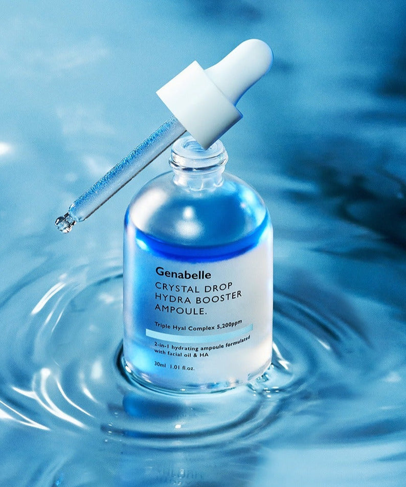 GENABELLE Crystal Drop Hydra Booster Ampoule 30ml with dropper in a serene water setting, highlighting its hydrating properties.