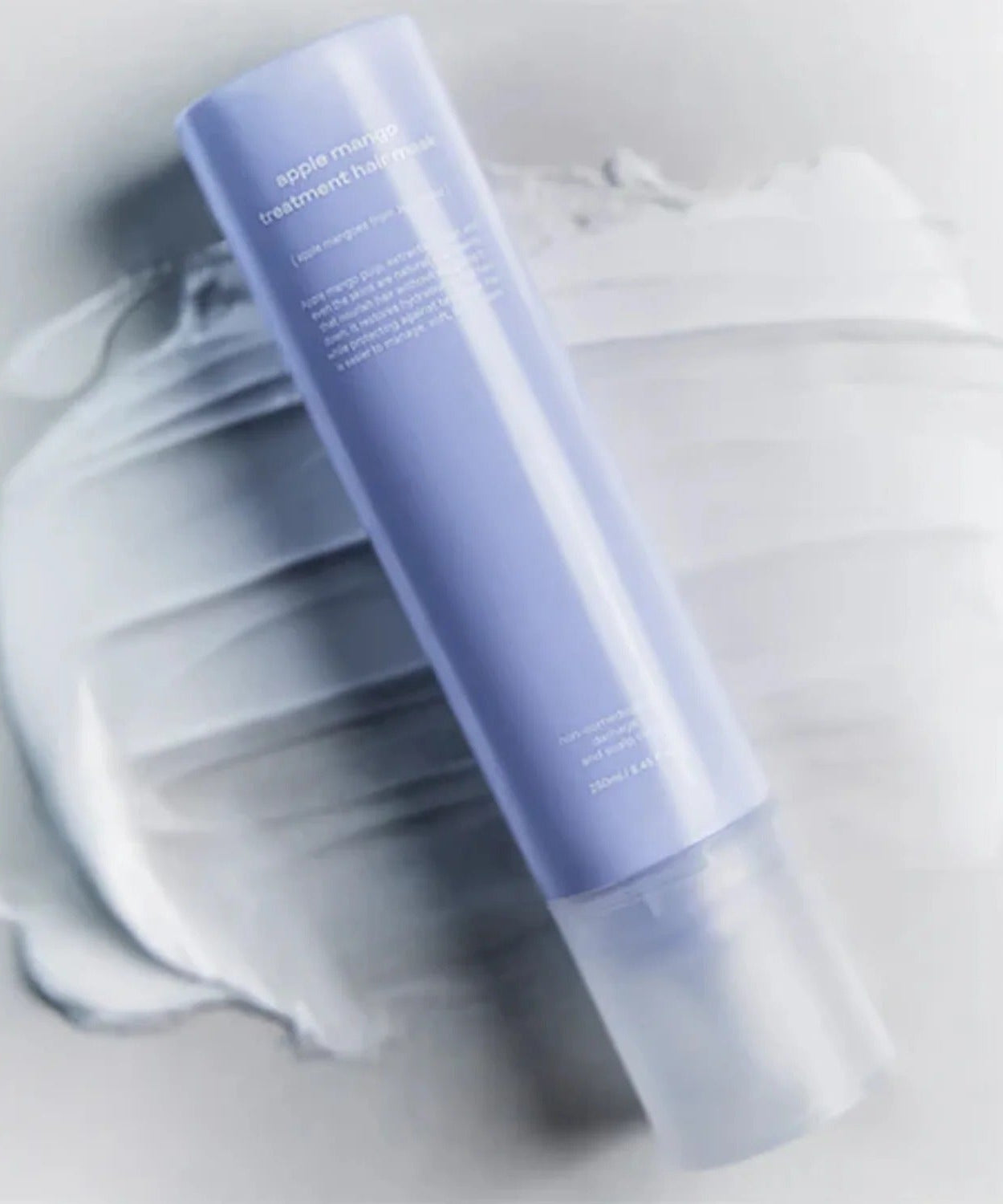 GLOW Apple Mango Hair Treatment 250ml on a white textured background.