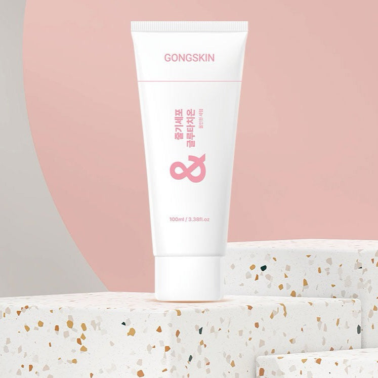 GONGSKIN Stem Cell Glutathione All-in-One Serum 100ml displayed on terrazzo blocks with a pink background