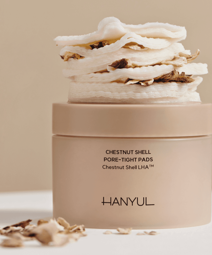 HANYUL Buddleberry Pore Tightening Pad displayed on a beige surface, showcasing its unique texture and packaging.