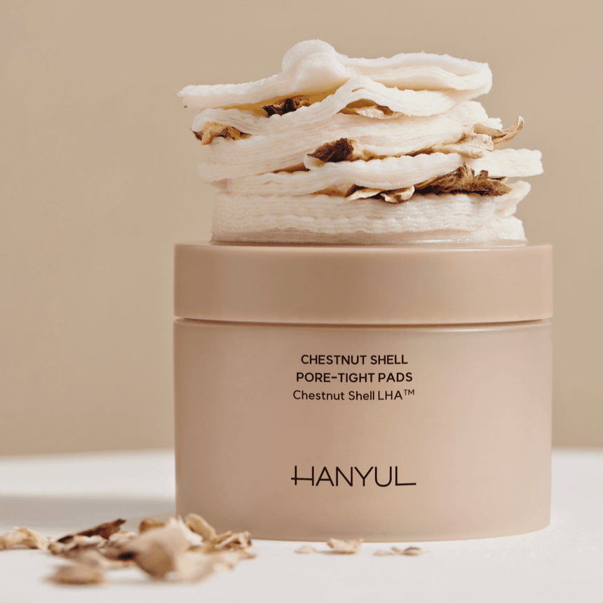 HANYUL Buddleberry Pore Tightening Pad displayed on a beige surface, showcasing its unique texture and packaging.
