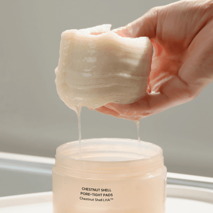 HANYUL Buddleberry Pore Tightening Pad for skincare, showing product texture and packaging.