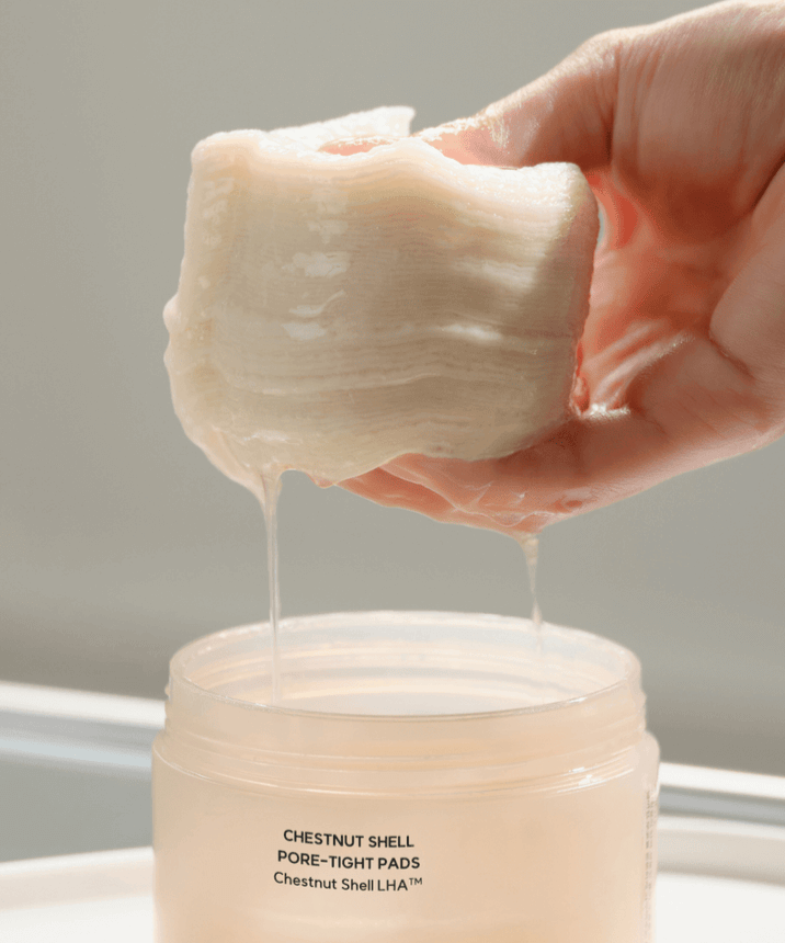 HANYUL Buddleberry Pore Tightening Pad for skincare, showing product texture and packaging.