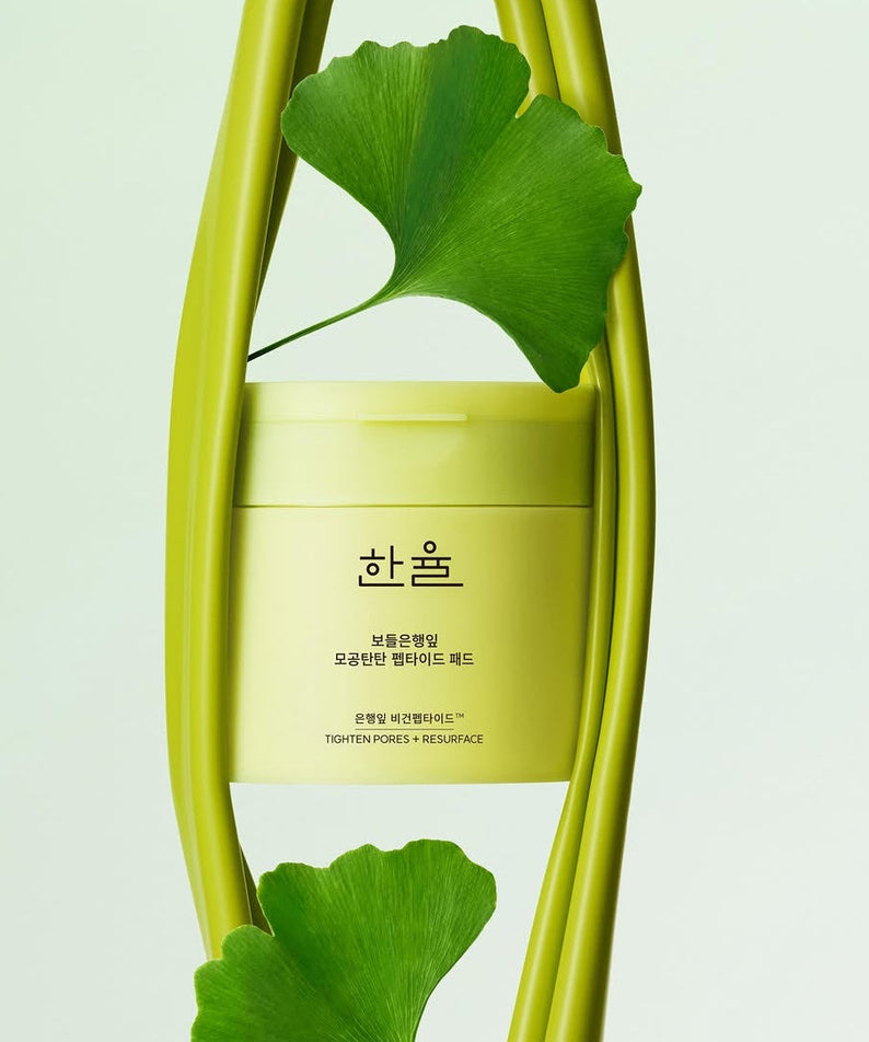 HANYUL Bodeunhaengip Pore Elasticity Peptide Pads 60 Sheets 100ml displayed with green leaves