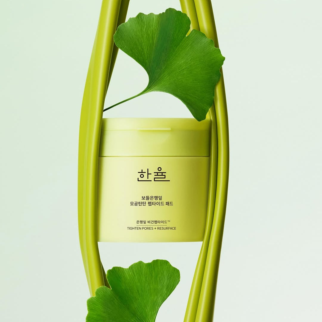 HANYUL Bodeunhaengip Pore Elasticity Peptide Pads 60 Sheets 100ml displayed with green leaves