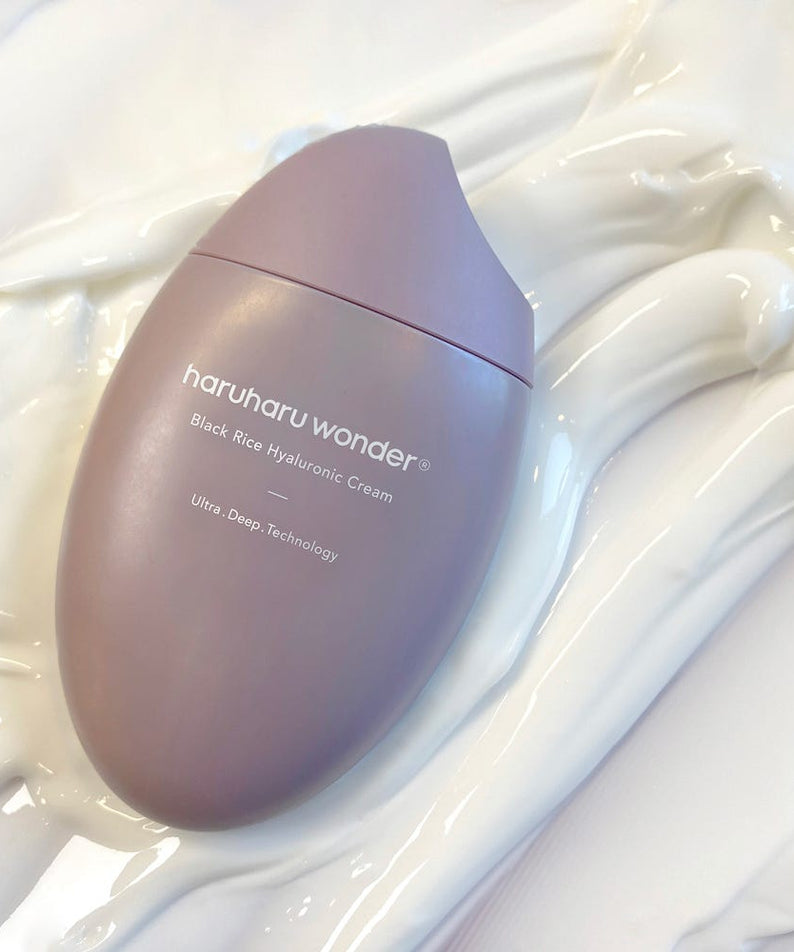 HARUHARU Black Rice 10 Hyaluronic Cream 50ml bottle on smooth cream surface