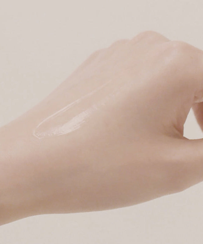 Texture of HARU HARU Black Rice Hyaluronic Essence 50ml on skin