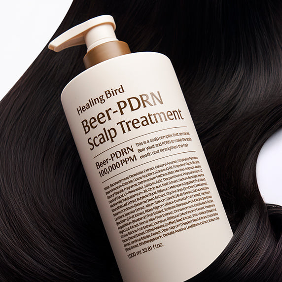 HEALING BIRD Beer PDRN Scalp Treatment 1000ml bottle on dark flowing hair background