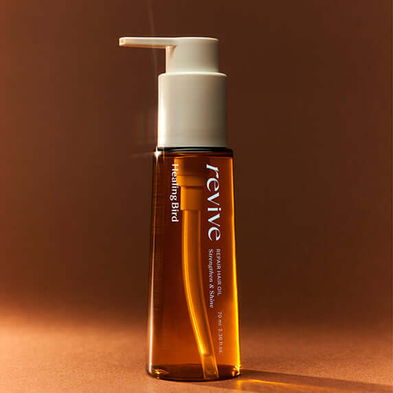 HEALING BIRD Revive Repair Hair Oil 70ml in elegant pump bottle