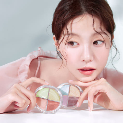 Woman holding HEALUS Breath Light Corrector 7g highlighting makeup product, close-up, beauty and cosmetics, pastel colors