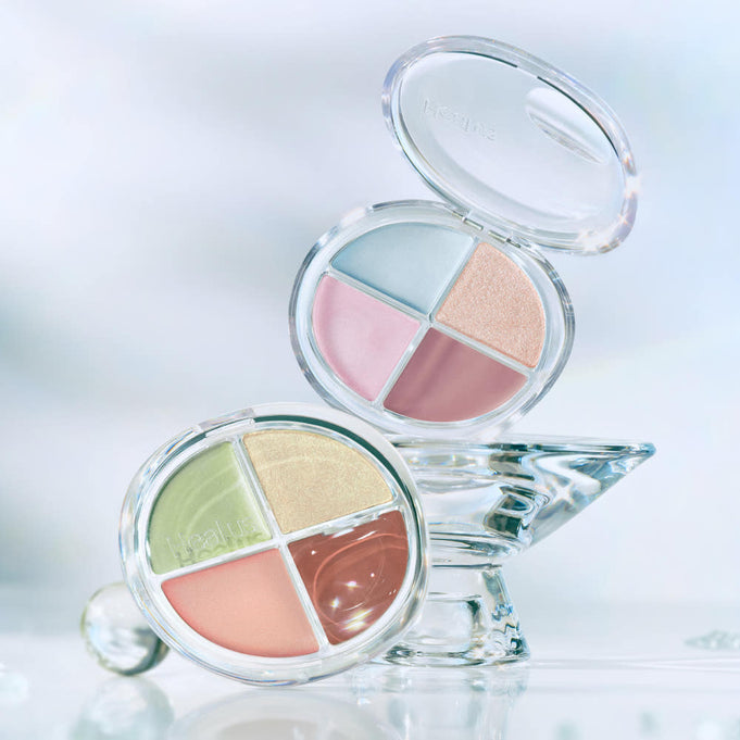 HEALUS Breath Light Corrector 7g makeup palette with pastel shades displayed on a stand, highlighting beauty and elegance.