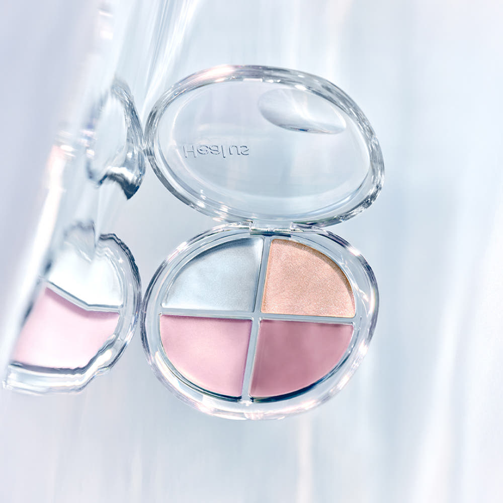 HEALUS Breath Light Corrector 7g in an open compact with four pastel shades