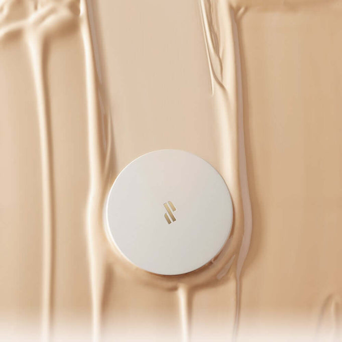 HEART PERCENT Dot ON Mood Layer Cushion on beige liquid background enhancing mood and style.