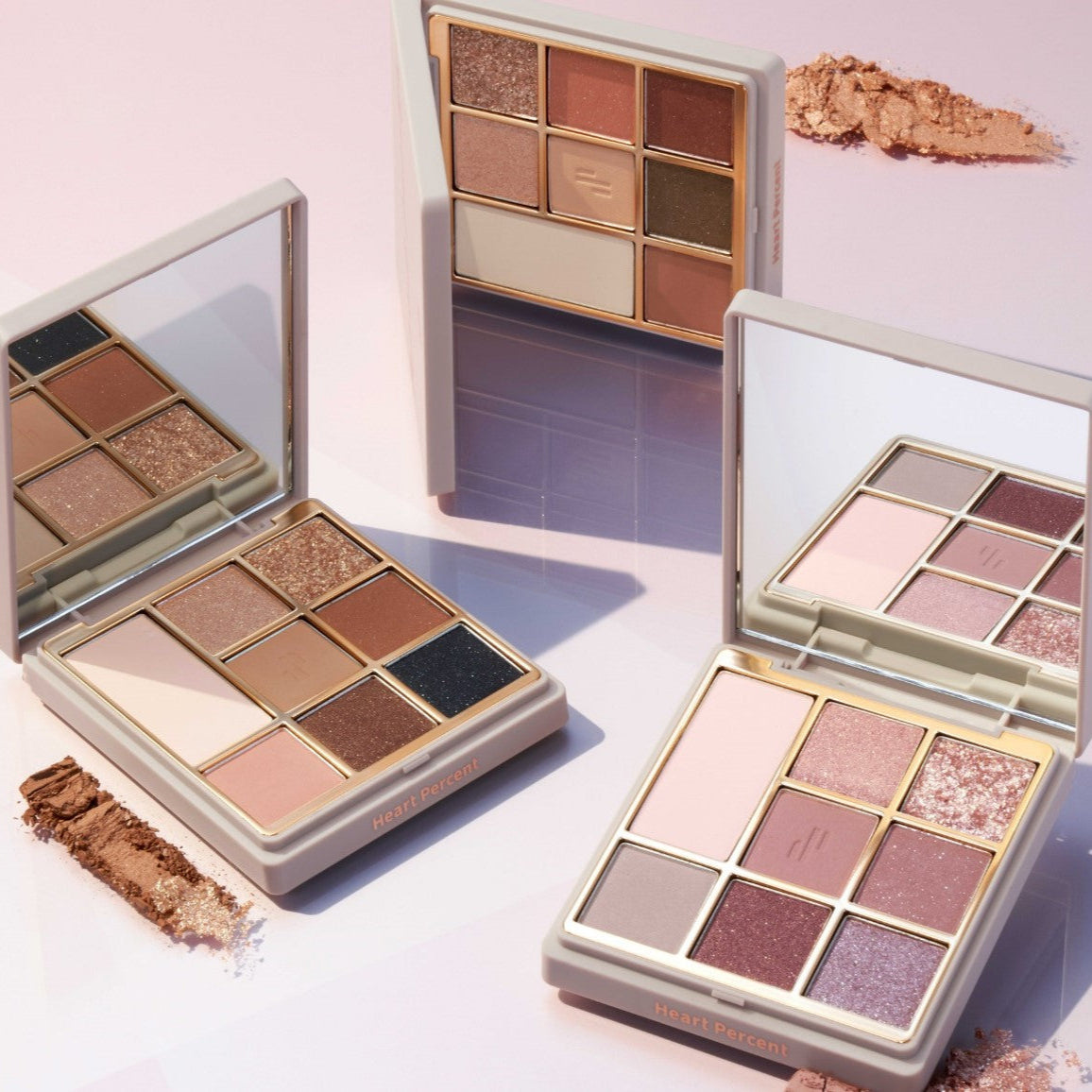 HEART PERCENT Dot On Mood Eye Palette featuring multiple shades with mirror and case, perfect for creating versatile eye makeup looks.