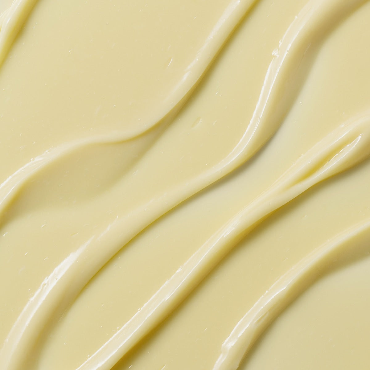 Texture of HEIMISH Marine Care Retinol For Face Serum 50ml showcasing creamy yellow formula and smooth application.