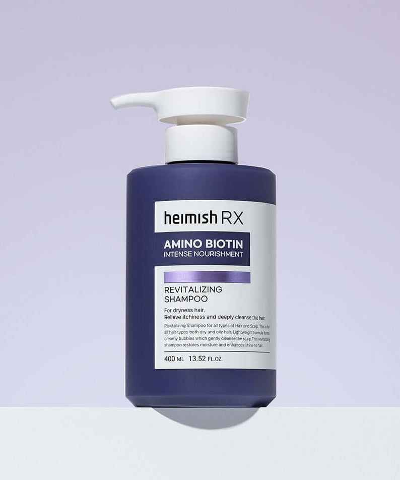 HEIMISH RX Amino Biotin Revitalizing Shampoo 400ml bottle against a light purple background