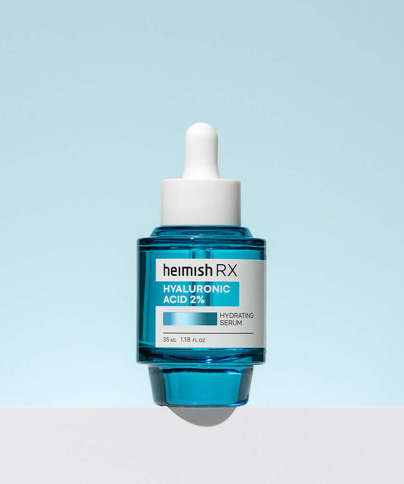 HEIMISH RX Hyaluronic Acid Hydrating Serum 35ml bottle with blue liquid and dropper, standing against a light background.