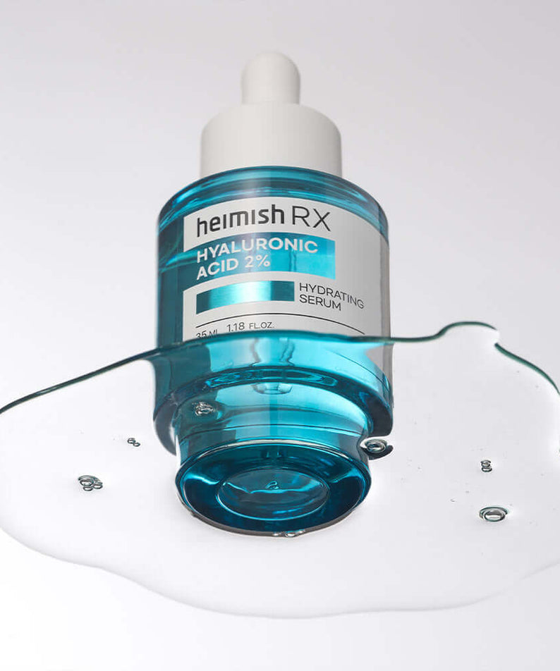 HEIMISH RX Hyaluronic Acid Hydrating Serum 35ml bottle with blue liquid spread, skincare, hydration, beauty product.