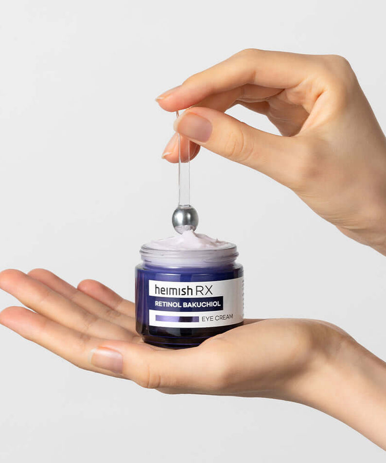 Close-up of HEIMISH RX Retinol Bakuchiol Eye Cream 30ml in hand with applicator