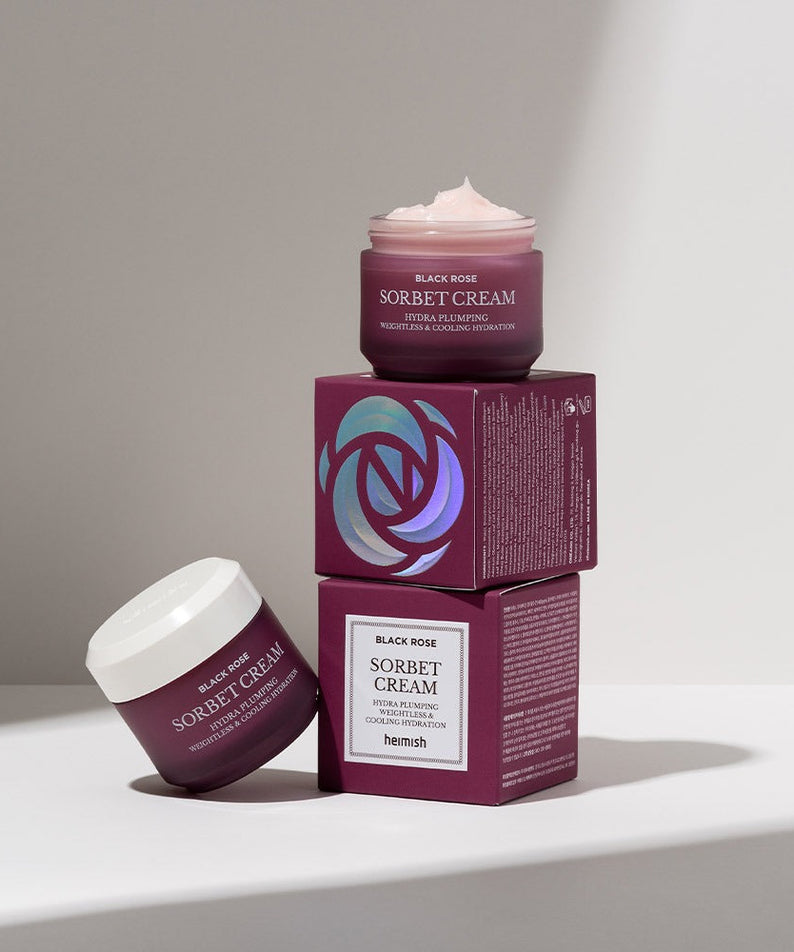 HEIMISH Black Rose Hydra Plumping Shavet Cream 50ml product packaging displayed on stacked boxes