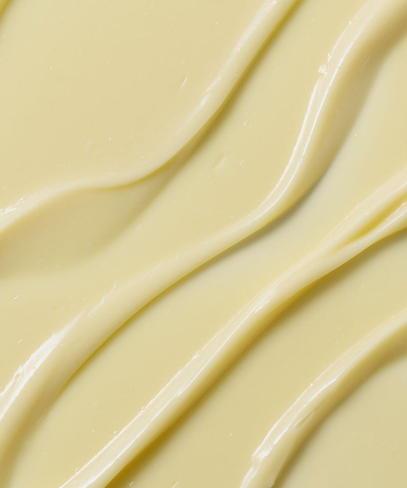 Texture of HEIMISH Marine Care Retinol For Face Serum 50ml showcasing creamy yellow formula and smooth application.