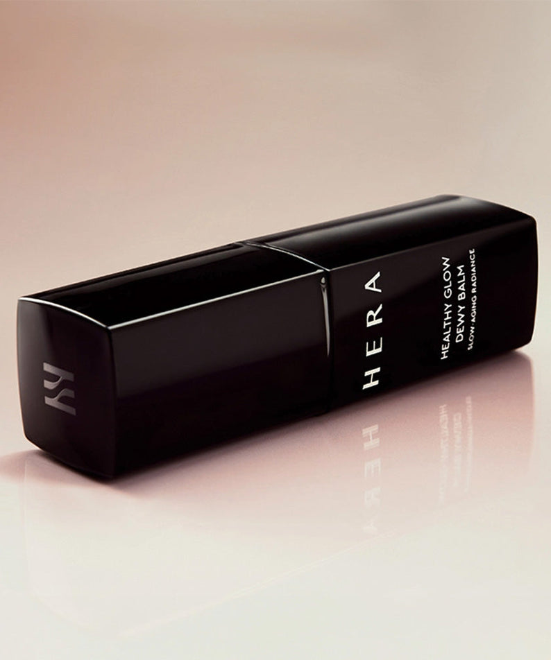 HERA Healthy Glow Dewy Balm 10g providing a radiant finish to enhance skin's natural luminosity. Ideal for a dewy and fresh appearance.
