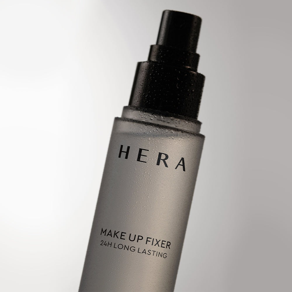 HERA Make Up Fixer 80ml bottle with long-lasting formula and sleek design.