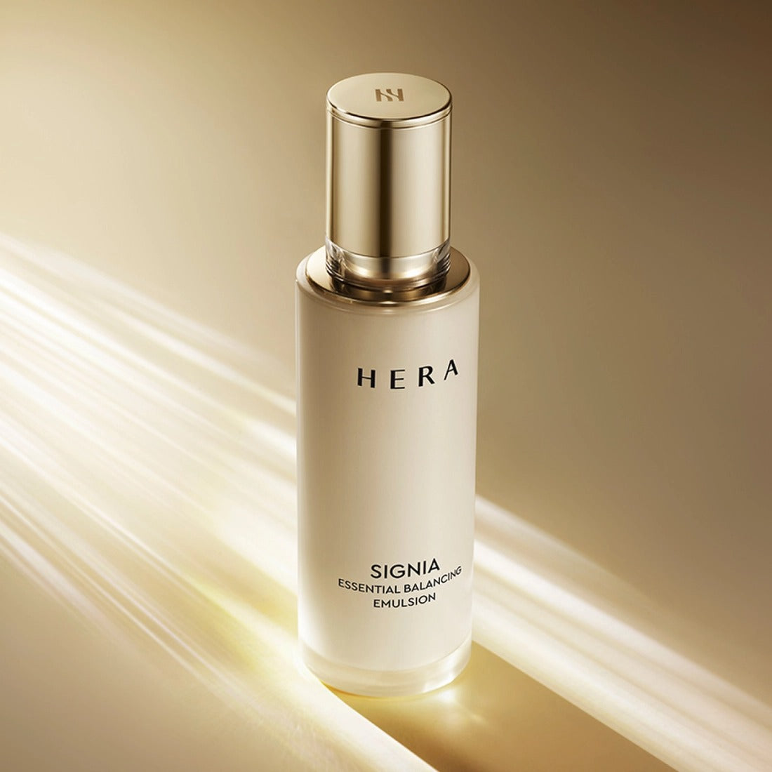 HERA Signa Essentail Balancing Emulsion 150ml bottle displayed on a golden background