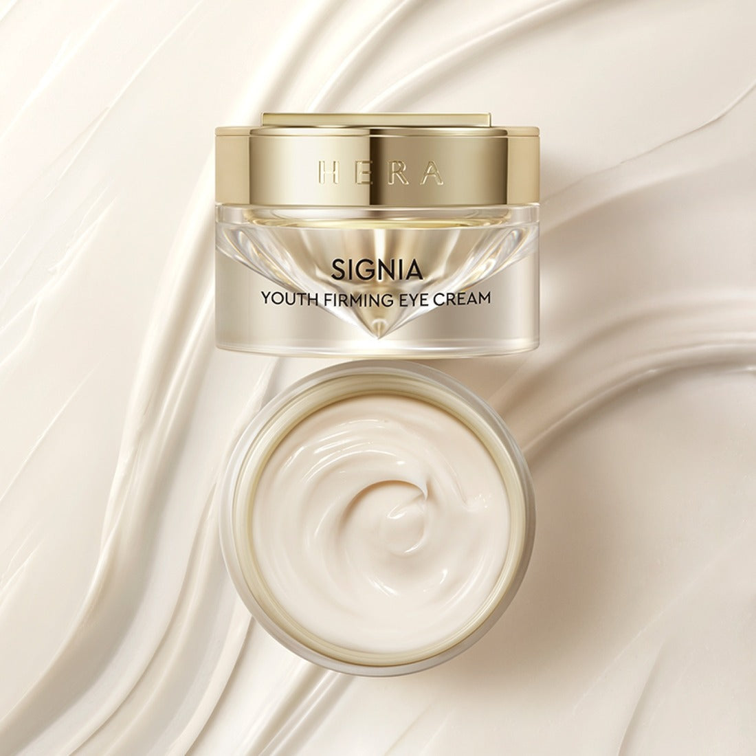 HERA Signa Youth Firming Eye Cream 30ml in an elegant jar with creamy texture, shown from top and side view on a smooth background.